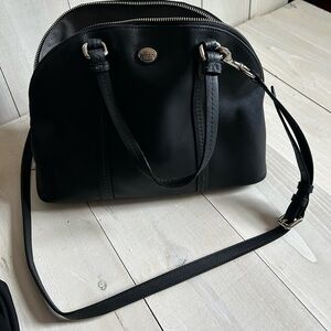 Coach Peyton black domed satchel with cross body strap.